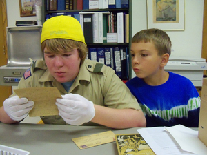 Kasey and Zach checking out a Letter from WWI